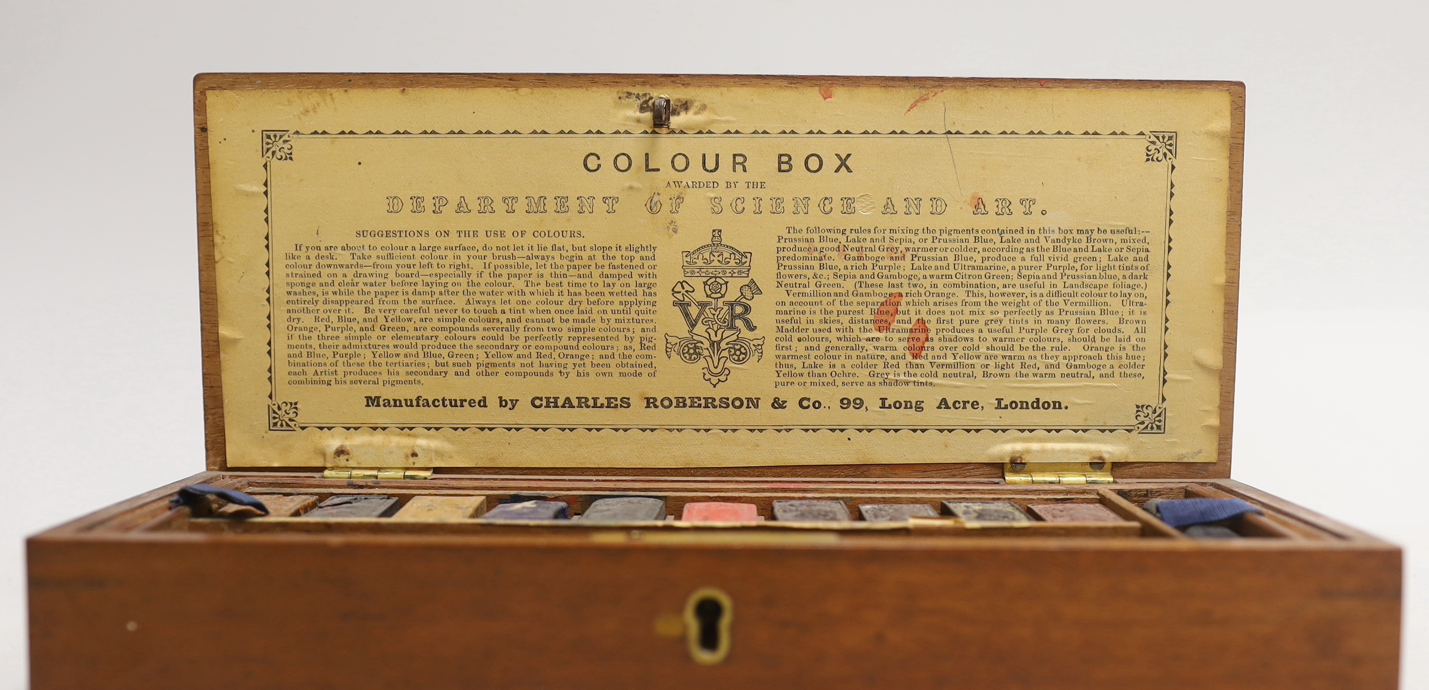 A Charles Roberson mahogany cased watercolourist's paints